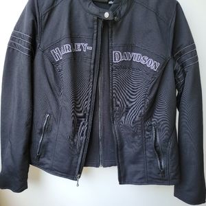 Harley Davidson women's jacket with removable vest. Size L. Like new condition.